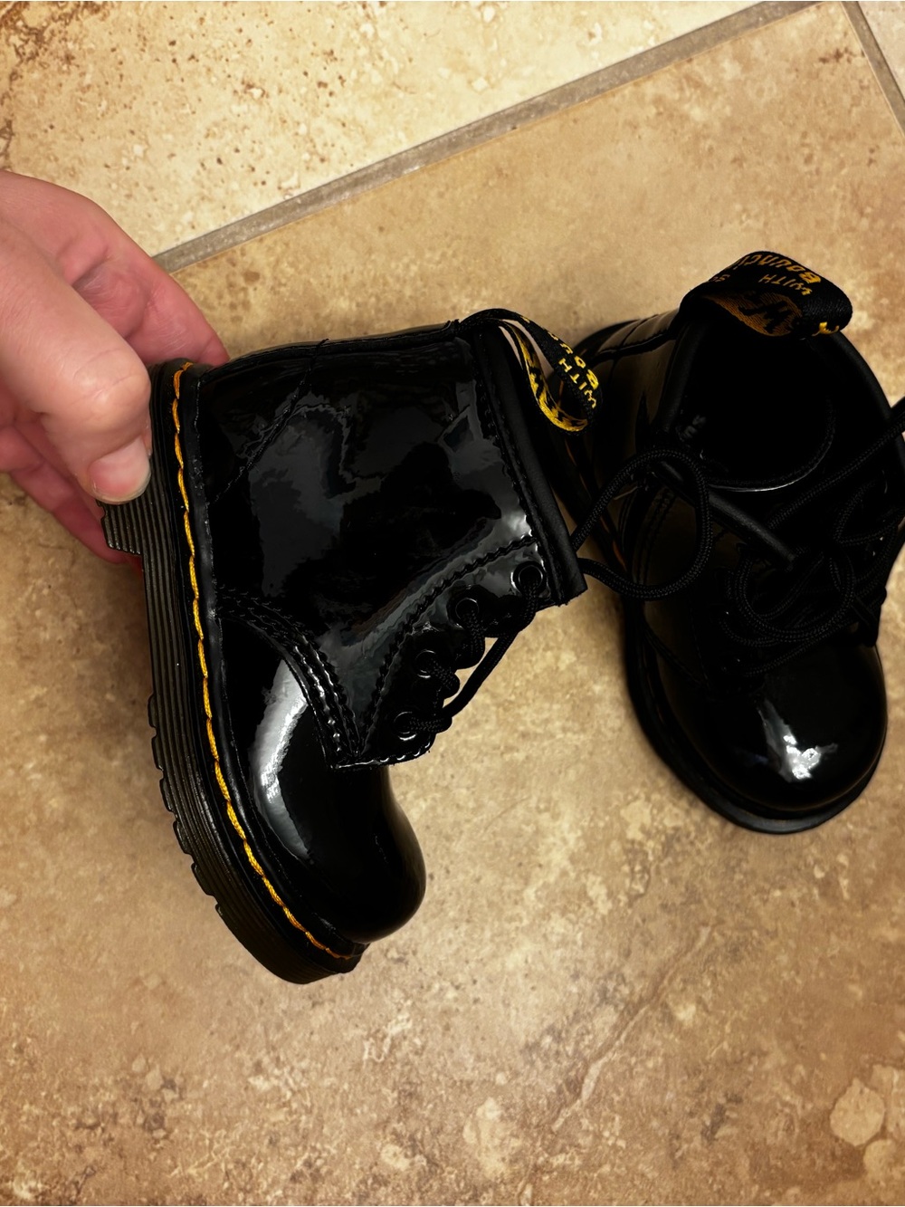 Dr. Martens Black Patent Toddler Lace-Up Boots with Yellow Stitchingu